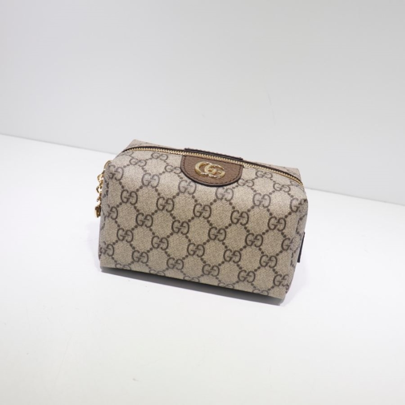 G*u*i cosmetic bags